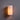 Cylindrical wall light fixture on a gray wall
