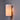Wall-mounted soft white light fixture with a cylindrical shade on a gray wall