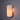 Wall-mounted light fixture with a cylindrical lucite shade on a dark background