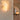 Wall-mounted light fixture on a textured wall
