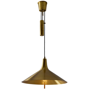 Brass farmhouse style pendant lamp on a white background