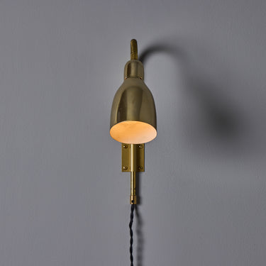 Pair of 1950s Perforated Brass Plug-in Wall Lamps Attributed to Lisa Johansson Pape