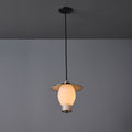 Pendant light with a glass shade on a gray background