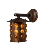 Bronze wall sconce with circular design on a white background