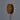 Decorative wall light with a textured design on a plain background