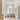 Modern interior with white walls, wooden floors, and decorative baskets.