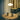 Two gray cups on a round wooden table with a pendant light in a room setting.