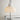 arenzano table lamp in chrome on a chrome and glass side table