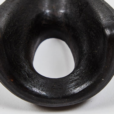 patinated brass bookend stamp detail on white background