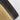 Close-up of a brass aubock dish logo on a white background