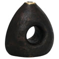 Black brass vase with a circular hole on a white background