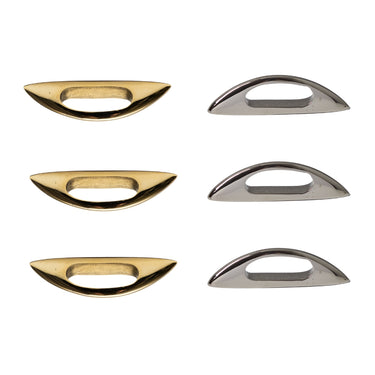 Set of gold and silver drawer handles on a white background