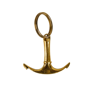 Gold anchor-shaped keychain on a white background
