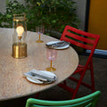 the_muse_in_brass_on_table_garden_setting_close_up_lifestyle_2048x2048_58db9e07-5ab7-4c9d-