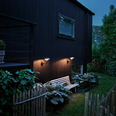 Poul Henningsen 'PH 3-2½' Outdoor Wall Lamp for Louis Poulsen Two Enlighten outdoor lit lifestyle 