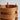 Wooden lamp with handles on a light gray background