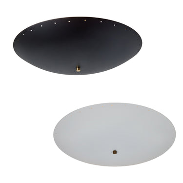 Two round midcentury flush mount perforated metal ceiling lights, one black and one white, on a white background.