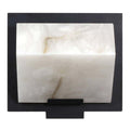 Decorative wall sconce with alabaster finish and black frame on a white background