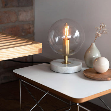 clear e12 candle led bulb tala in a lamp