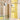 Modern bathroom interior with yellow tiles, glass shelves, and grey pendant lights. 'Cirque' Pendant Lamp by Clara von Zweigbergk for Louis Poulsen Two enlighten