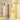 Modern bathroom interior with yellow tiles, glass shelves, and grey pendant lights.