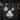 Modern pendant lights hanging above a bar with dark cabinets and beer taps 'Cirque' Pendant Lamp by Clara von Zweigbergk for Louis Poulsen Two enlighten