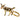 Gold donkey-shaped keychain on a white background