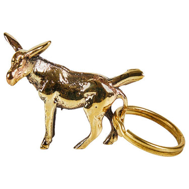 Gold donkey-shaped keychain on a white background