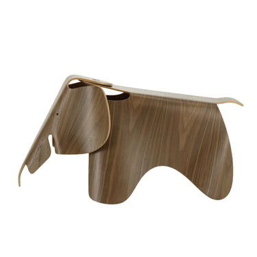 eames Wooden elephant-shaped object on a white background