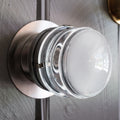fresnel grey finish wall light three quarter view on wall
