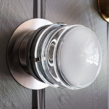 fresnel grey finish wall light three quarter view on wall