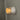 white oluce colombo fresnel wall light lit up side view
