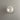 Round ceiling light fixture on a gray wall
