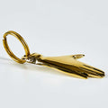 Gold hand keychain on a white background