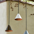 Mini_Tratten_Outdoor_Pendants white brown silver hanging from a tree