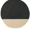 Round rug with black top half and beige bottom half on a white background