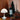 Panthella Two Enlighten Poulsen Holiday with ornaments and wine open on warm wood background