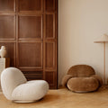 GUBI pacha in living room brown velvet chairs