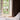 Window with brown curtain and pink lamp in a bright room