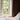 Window with brown curtain and pink lamp in a bright room