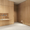 njp mini table lamp in an oak paneled office