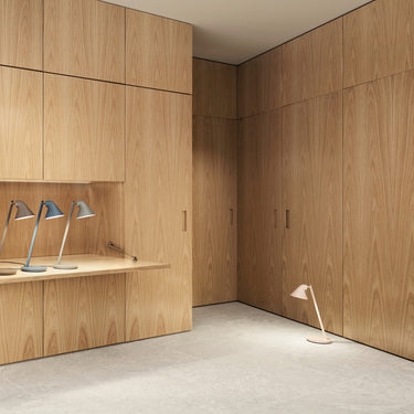 njp mini table lamp in an oak paneled office