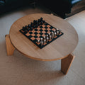 aubock chess set on a prouvé table
