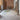 quill rugs with bicycle in brick loft