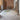 quill rugs with bicycle in brick loft