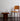 standard chair with vl56 pendant and tynell glass vase against a white wall