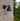 black modern outdoor wall light on brick wall toldbod louis poulsen model