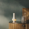 Louis poulsen white Tomoshi white lantern on a kitchen counter