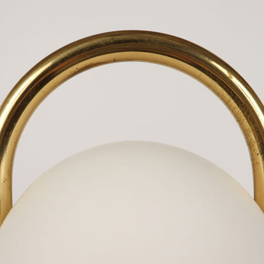 brass handle close up of tronconi tender lamp