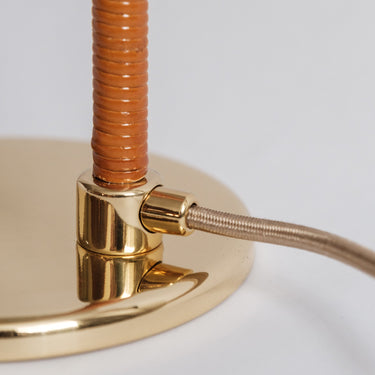 rattan and brass detail of paavo tynell 5321 lamp